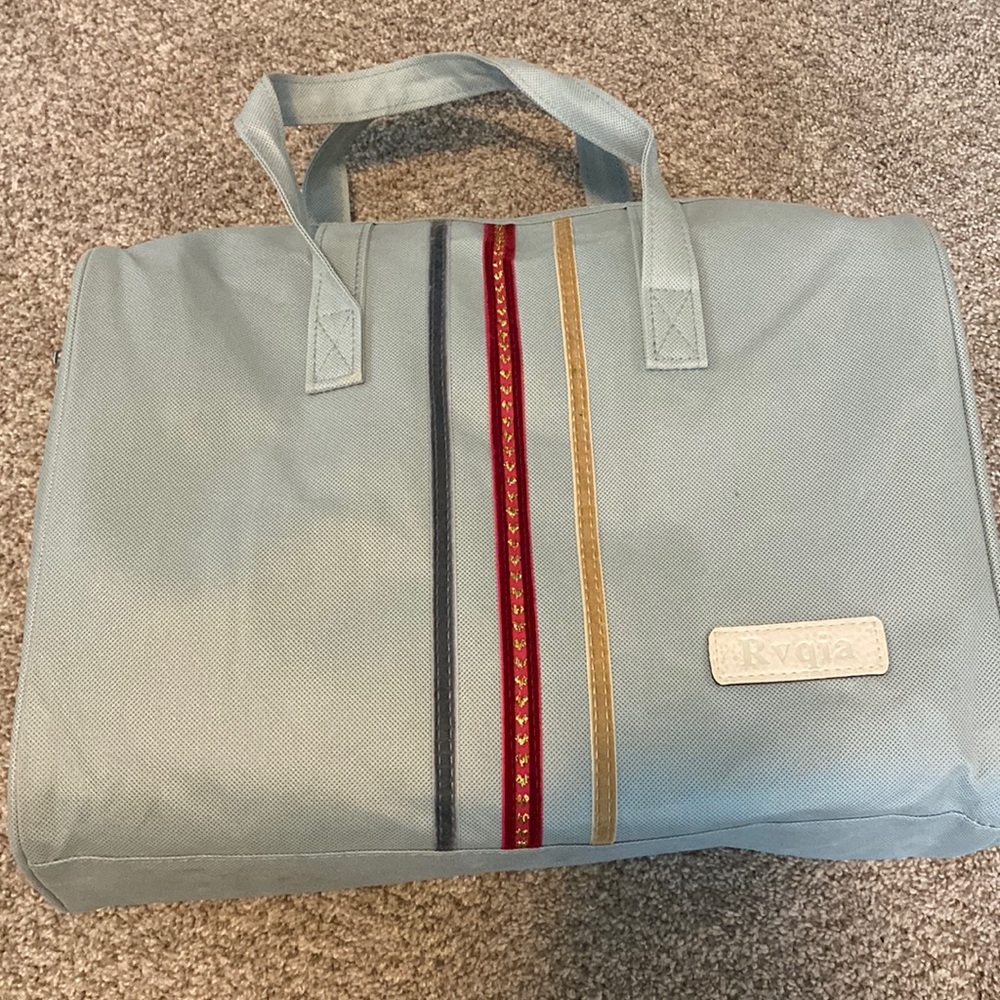 medium size bag, 15 1/2 x 12 x 6 inch dimensions, never used